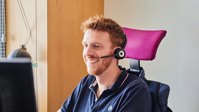 A man at the Tourist Office call centre