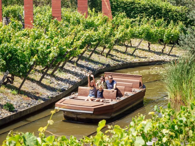 Family in a boat at Terra Botanica