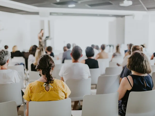 Assembly at a meeting, back view